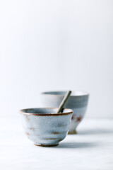 Traditional, handcrafted ceramic on bright background. Soft focus. Copy space.