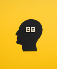 The Mocking Man Head. Simple Composition with Black Human Head and Wooden Blocks with 