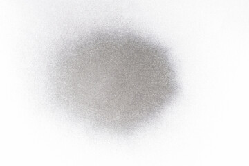 a spray spray paint stain on a white paper background