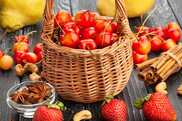 red yellow cherries on wood background
