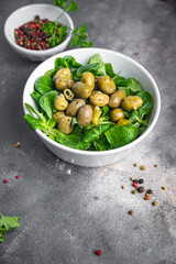 olive salad, leaf lettuce, mache corn lettuce fresh healthy meal food snack diet on the table copy space food background