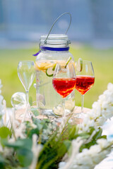 Two glasses of Spritz Veneziano cocktail served near the Venetian canal.