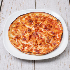 pizza on a wooden board