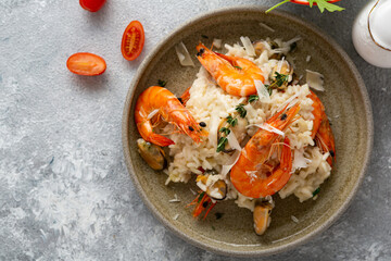 Overhead view of rice risotto with seafood shrimps mussels