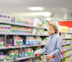 shopping in supermarket.(washing powder,detergent,shampoo, soap)