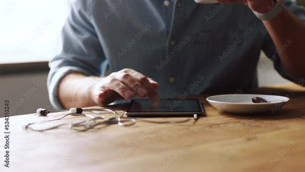 Poster businessman, hands and tablet with coffee at cafe browsing or reading work information. hand of male