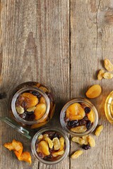 Brandied Dried Fruit. Mix of dried fruits soaking up brandy or rum. Concept for National Brandied fruit day.