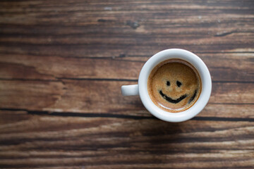 Cup of coffee on wooden table