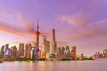 View of the skyline along the riverside at sunrise in Shanghai, China.