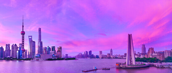 View of the skyline along the riverside at sunrise in Shanghai, China.