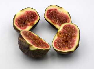Sliced figs isolated on white background