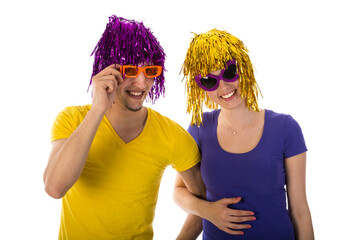 Man and woman with sunglasses and carnival wigs isolated on transparent background