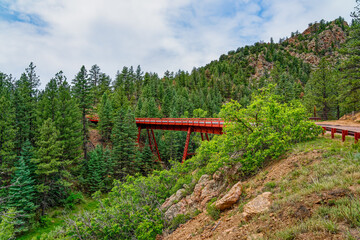 red, steel, trestle bridge called Bridge No. 10 or Adelaide Bridge, built 1894 for the Florence and...