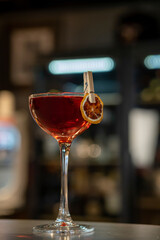 Alcoholic cocktails on the bar. Bellini. Bar atmosphere.