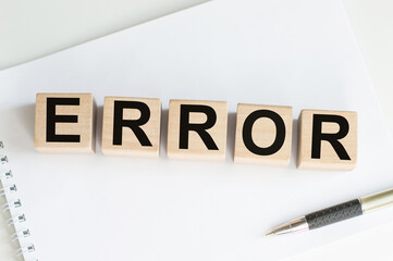 ERROR word made with building blocks, business concept.
