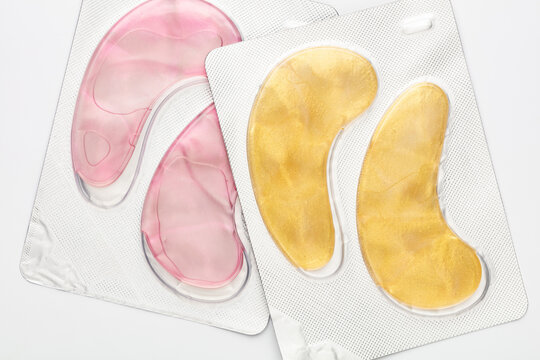 Gold hydrogel eye patches background.