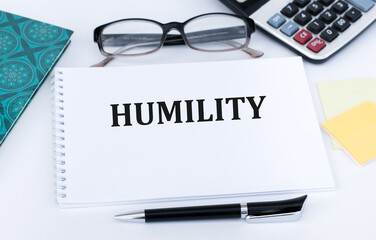 HUMILITY - text on a notepad on office desk, business concept