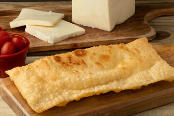 Typical Brazilian snack pastel with cheese.
