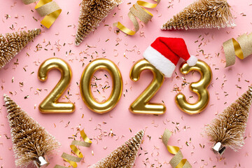 Happy New Year 2023 poster. Christmas background with gold 2023 numbers.