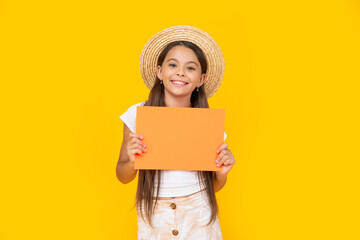 teen girl smile with copy space on orange paper on yellow background