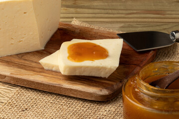 Delicious cheese with mango jam. Selective focus.