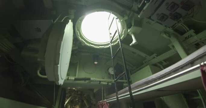 Round bulkhead door in submarine. access to the surface and to the observation deck