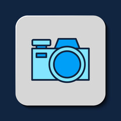 Filled outline Photo camera icon isolated on blue background. Foto camera icon. Vector