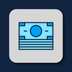 Filled outline Stacks paper money cash icon isolated on blue background. Money banknotes stacks. Bill currency. Vector