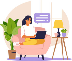 Woman sitting table with laptop and phone. Working on a computer. Freelance, online education or social media concept. Studying concept. 