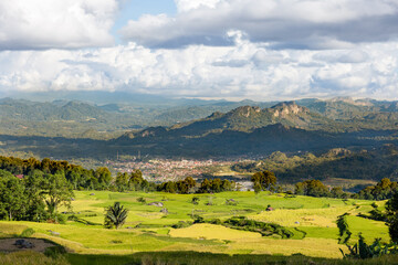Overview of Rantepao, capital of Toraja country, surrounded by mountains, jungle and rice paddies, Sulawesi, Indonesia
