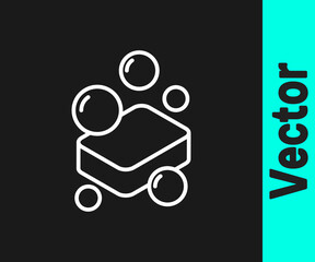 White line Bar of soap icon isolated on black background. Soap bar with bubbles. Vector