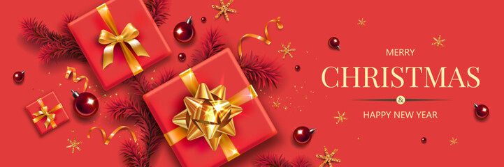 Horizontal banner with gold and red Christmas symbols and text. Christmas tree, gifts, golden tinsel confetti and snowflakes on the red background. Header for website template.
