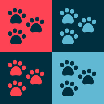 Pop art Paw print icon isolated on color background. Dog or cat paw print. Animal track. Vector
