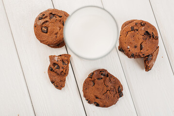 A glass of milk and biscuits for breakfast. Benefits of milk
