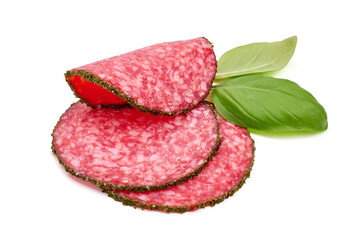 Peppered salami slices, isolated on white background.