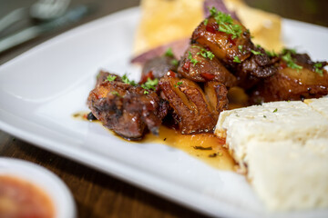 Typical colombian food and drinks, bacon with cheese