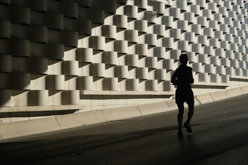 Silhouette of a running woman running special for the 100th anniversary of Izmir's liberation in...