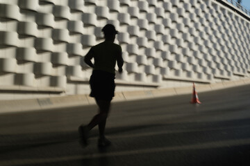 Silhouette of a running woman running special for the 100th anniversary of Izmir's liberation in...