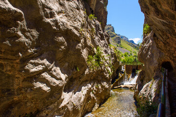 Cares river gorge route. Hiking trail in Picos de Europa National Park, Spain. Mountain path between impressive cliffs