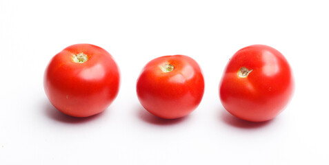 vegetables tomatoes n a white background studio photo