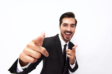 Portrait of a man in an expensive business suit close-up of a wide-angle lens pulling his hands into the camera with his mouth open against a white background