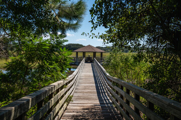 HILTON HEAD ISLAND, South Carolina, USA - Sep 24, 2022: Boardwalk and covered gazebo at the Historic Mitchelville Freedom Park.