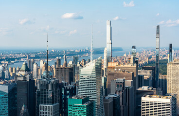 New York skyline, panoramic view with skyscrapers in Midtown Manhattan with blue sky