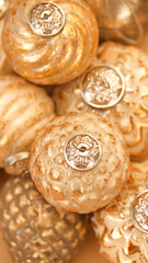 Fototapeta premium Christmas Golden balls texture. New Year's decor.Christmas tree decorations texture.Festive shiny background in Gold tones.design Christmas decorations.