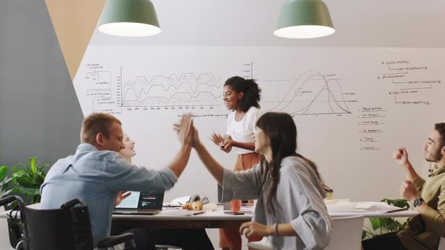 Teamwork presentation, high five celebration and achievement, success and winning deal in startup company. Happy, motivation and excited meeting, collaboration and employees support, goals and target