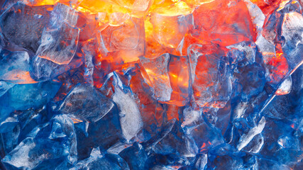 Vibrant depiction of the contrast between fire and ice wallpaper. Cold blue frozen ice, melting...