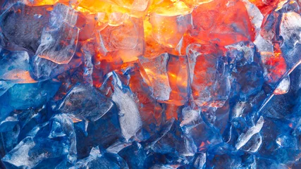 Fototapeten Feuer & Flamme Vibrant depiction of the contrast between fire and ice wallpaper. Cold blue frozen ice, melting over hot red fire.  © Leigh Prather