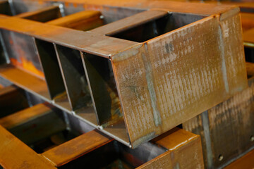 Welded fabrication made of beams stacked in plant warehouse