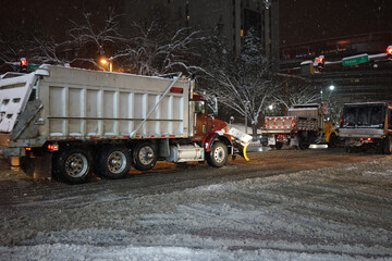 Snow fall in Silver spring (Maruland) during the night; truck entering the city to clean snow