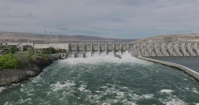Drone aerial of a hydroelectric dam along the Columbia River. Shot on Mavic 3 Cine. 30 fps. 4k resolution. Prores.